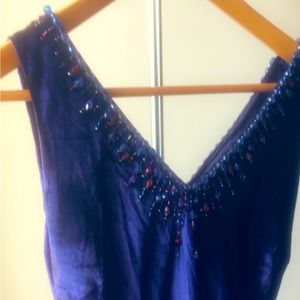 Velvet dress , beads around the neck